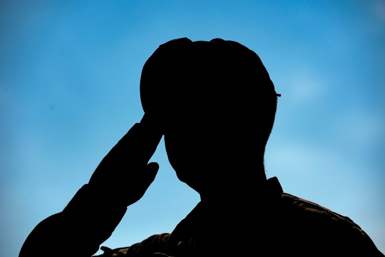 Tech. Sgt. Daniel Fandel, 822d Base Defense Squadron leader, renders salutes while taps plays during the closing ceremony for Nation Police Week 2019, May 17, 2019, at Moody Air Force Base, Ga. The ceremony was a part of Moody’s support of National Police Week, to pay tribute to all law enforcement officers who serve and protect the united States with courage and dedication. (U.S. Air Force photo by Senior Airman Erick Requadt)