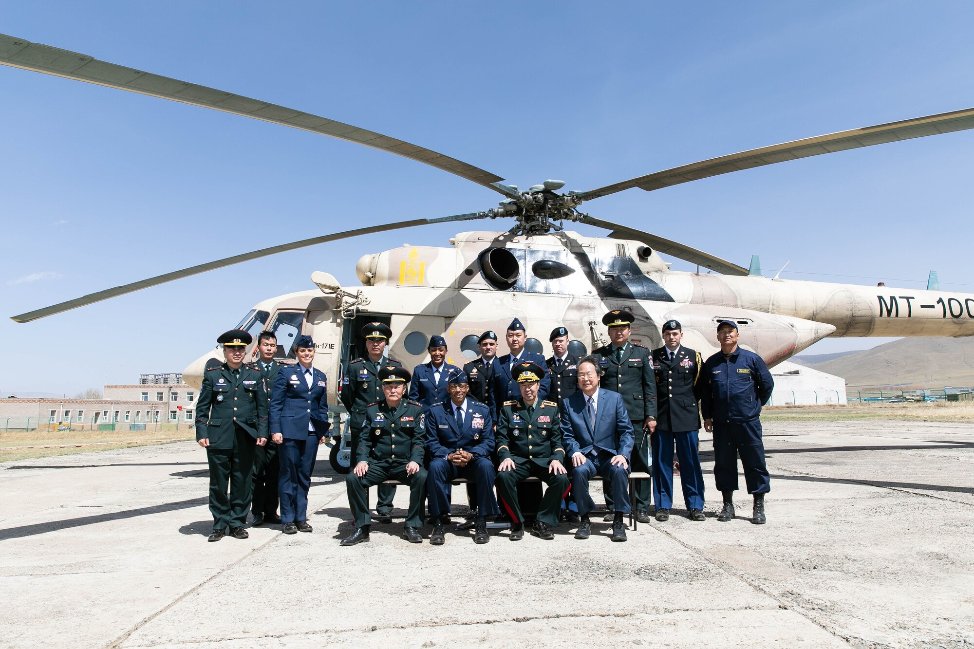 Gen. CQ Brown, Jr., Pacific Air Forces commander, and his staff, visit with members of the Mongolian Air Force Command during a tour of Unit 303 at the Chinggis Khaan International Airport May 14. In his first visit to the country, Brown met with senior leaders from Mongolia and the United States to seek opportunities to enhance cooperation and partnership with the Mongolian Air Force Command. (photo courtesy US Embassy)