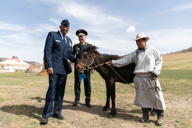 Gen. CQ Brown, Jr., Pacific Air Forces commander, received the traditional gift of a horse from the Mongolian Air Force Command during a visit to the Chingisiin Huree camp south of Mongolia's capital, Ulaanbaatar, May 14. Brown had the honor of naming the horse, to remain in country to exemplify the enduring relationship between the two nations and two air forces. In tribute to his home state of Texas and the state from which he now serves, Hawaii, the general named the young horse, â€œLone Star Koa.â€ Koa is Hawaiian for warrior. (photo courtesy US Embassy)