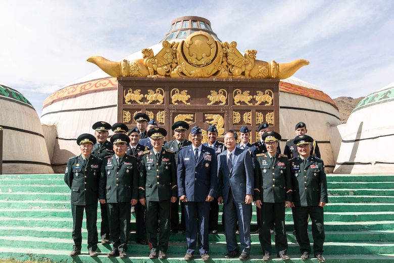 Gen. CQ Brown, Jr., Pacific Air Forces commander, Brig. Gen. Enkhbayar Ochir, commander of Mongolian Air Force Command (MAFC), and their staffs pose for a group photo at the Chingisiin Huree camp south of Mongolia's capital, Ulaanbaatar, May 14. In addition to evaluating the recent success of the Airman-to-Airman Talks in Hawaii in March, discussions during the visit included opportunities to enhance training, exercises and subject matter expert exchanges. (photo courtesy US Embassy)