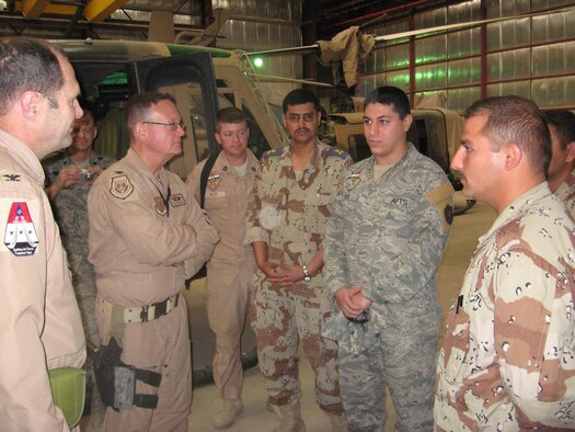 Capt. Aljammaly stands with teammates in Iraq. Aljammaly direct commissioned into the Air Force in 2015.