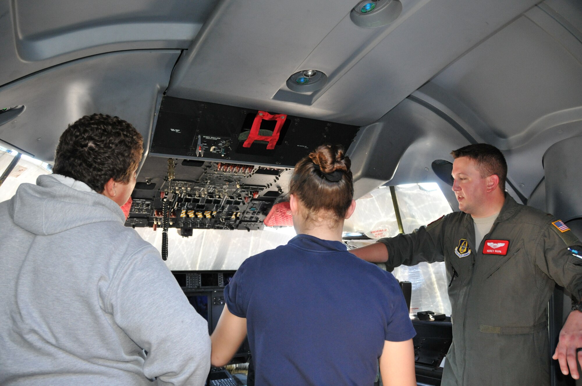 Students from the St. Martin Middle School were given a tour of the C-130J aircraft by 2nd Lt. Korey Papa, 815th Airlift Squadron pilot, today at Keesler Air Force Base, Mississippi. Tech. Sgt. Ronald Patton, 403rd Operations Support Squadron life support specialist, showed them some of the equipment used by the aircrew during their flights. They also received a briefing by Capt. Sydney Negrete, 36th Aeromedical Evacuation Squadron flight nurse, who demonstrated her mission of providing medical care in the air.  (U.S. Air Force photo by Jessica L. Kendziorek)