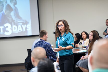 Carmella Navarro, Suicide Prevention Program Manager, 85th U.S. Army Reserve Support Command, gives remarks during the 85th USARC’s ’Stand For Life’ suicide prevention training, May 6-10, 2019, at the 85th USARSC headquarters.