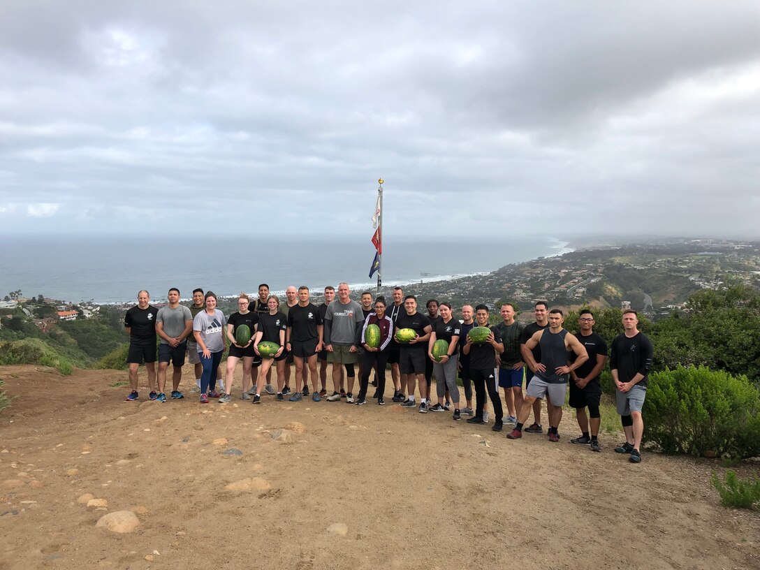 U.S. Marines assigned to 12th Marine Corps District, Western Recruiting Region, pose for a photo at Mount Soledad after a physical training event in San Diego, Calif., May 17, 2019.