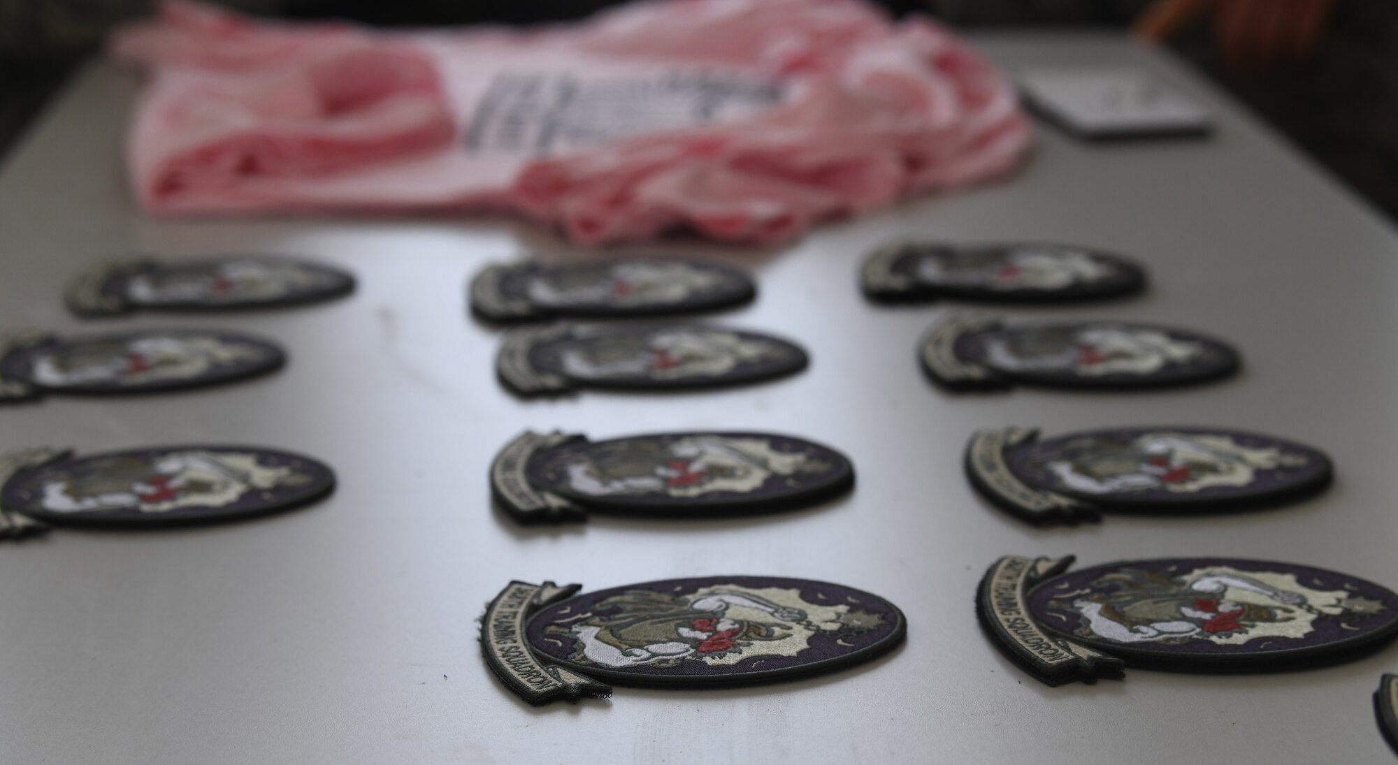 Uniform patches sitting on table