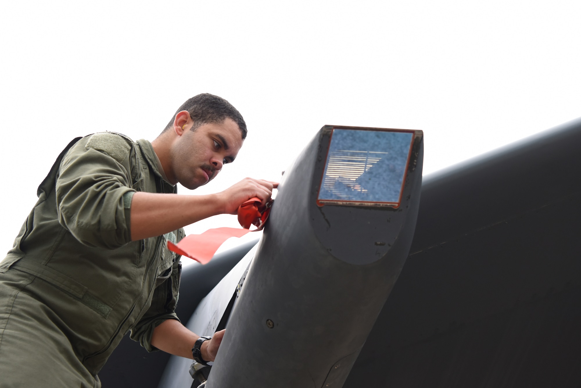 U.S. Air Force Capt. Nathan Fisher, 23rd Expeditionary Bomb Squadron weapons systems operator, conducts a preflight inspection for a B-52 Stratofortress during Exercise Diamond Storm at Royal Australian Air Force Base Darwin, Northern Territory, Australia, May 9, 2019.