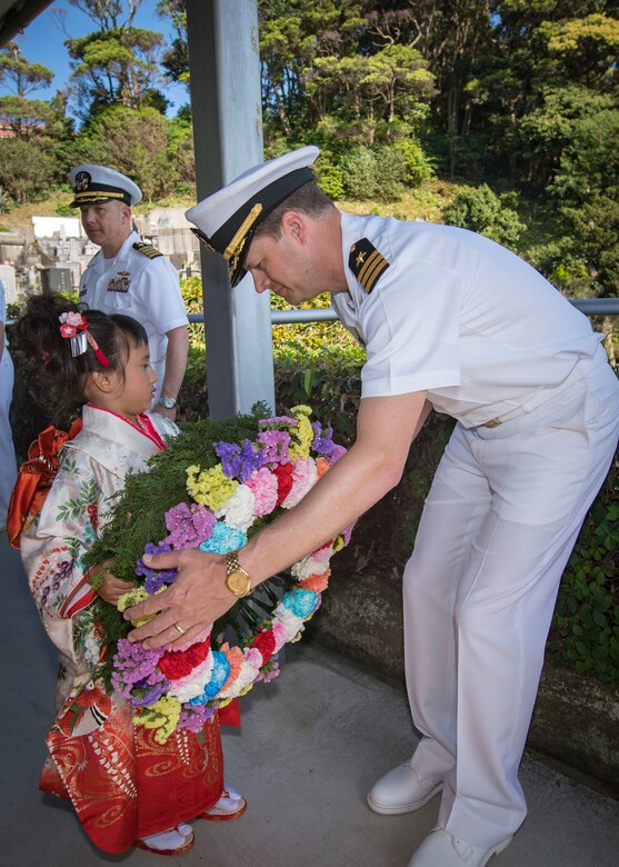 SHIMODA, Japan (May 17, 2019) Cmdr. Jeff W. Benson, commanding officer of USS Stethem (DDG 63), receives a wreath during a memorial service at Gyokusenji Temple during the 80th annual Shimoda Black Ship Festival. The Navy’s participation in the festival celebrates the heritage of U.S.-Japanese naval partnership first established by Commodore Matthew Perry’s 1853 port visit.