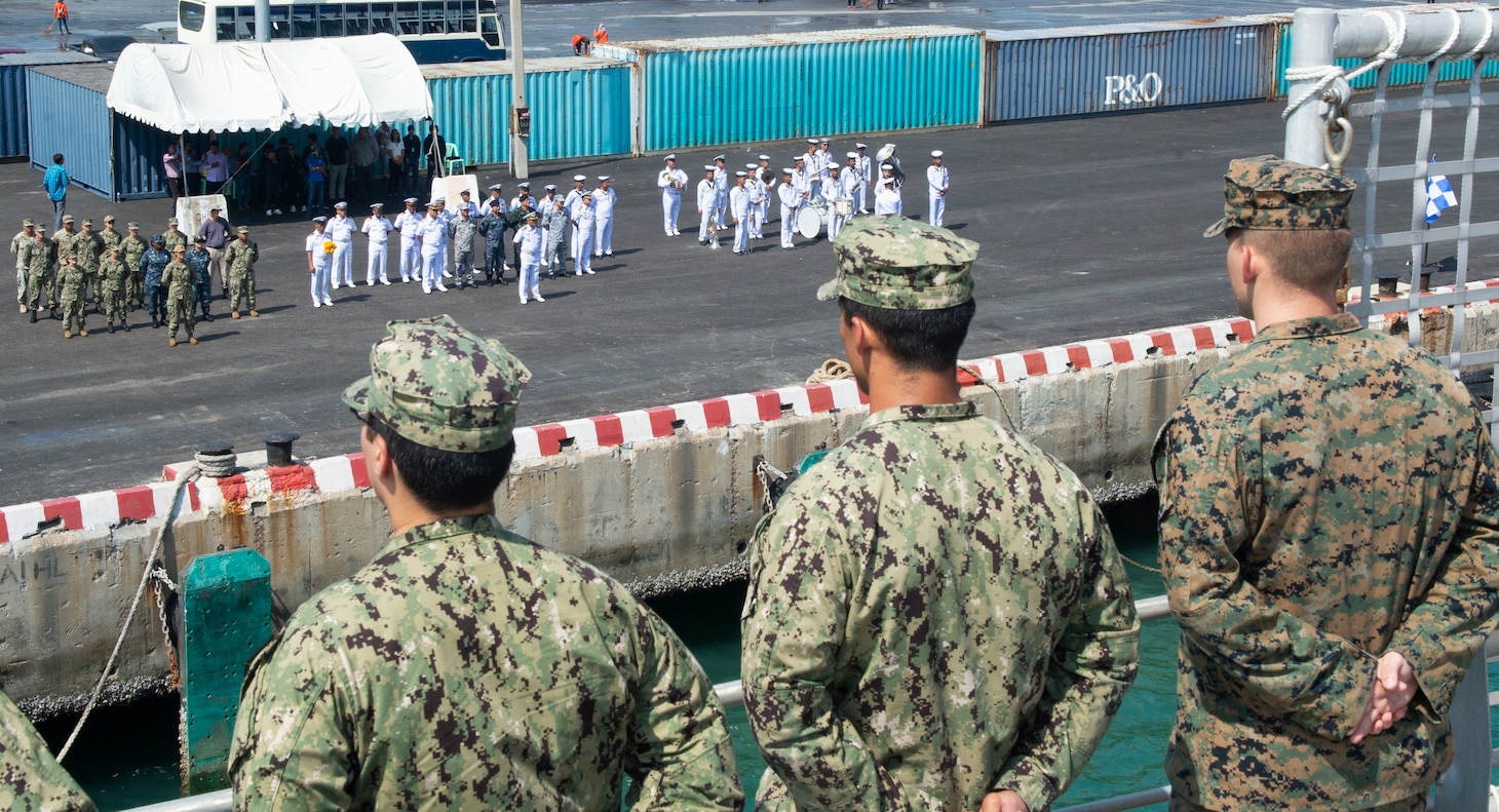 Sattahip, Thailand (May 18, 2019) – Members of the Royal Thai Navy welcome fast expeditionary transport ship USNS Fall River (T-EPF 4) to Thailand as Pacific Partnership participants man the rails. Pacific Partnership, now in its 14th iteration, is the largest annual multinational humanitarian assistance and disaster relief preparedness mission conducted in the Indo-Pacific. Each year the mission team works collectively with host and partner nations to enhance regional interoperability and disaster response capabilities, increase security and stability in the region, and foster new and enduring friendships in the Indo-Pacific.