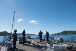 PALAU (May 15, 2019) U.S. Navy Sailors monitor the anchor chain after releasing the anchor aboard the guided-missile destroyer USS Chung-Hoon (DDG 93). Chung-Hoon is deployed to the U.S. 7th Fleet area of operations in support of security and stability in the Indo-Pacific region. (U.S. Navy photo by Mass Communication Specialist 2nd Class Logan C. Kellums)