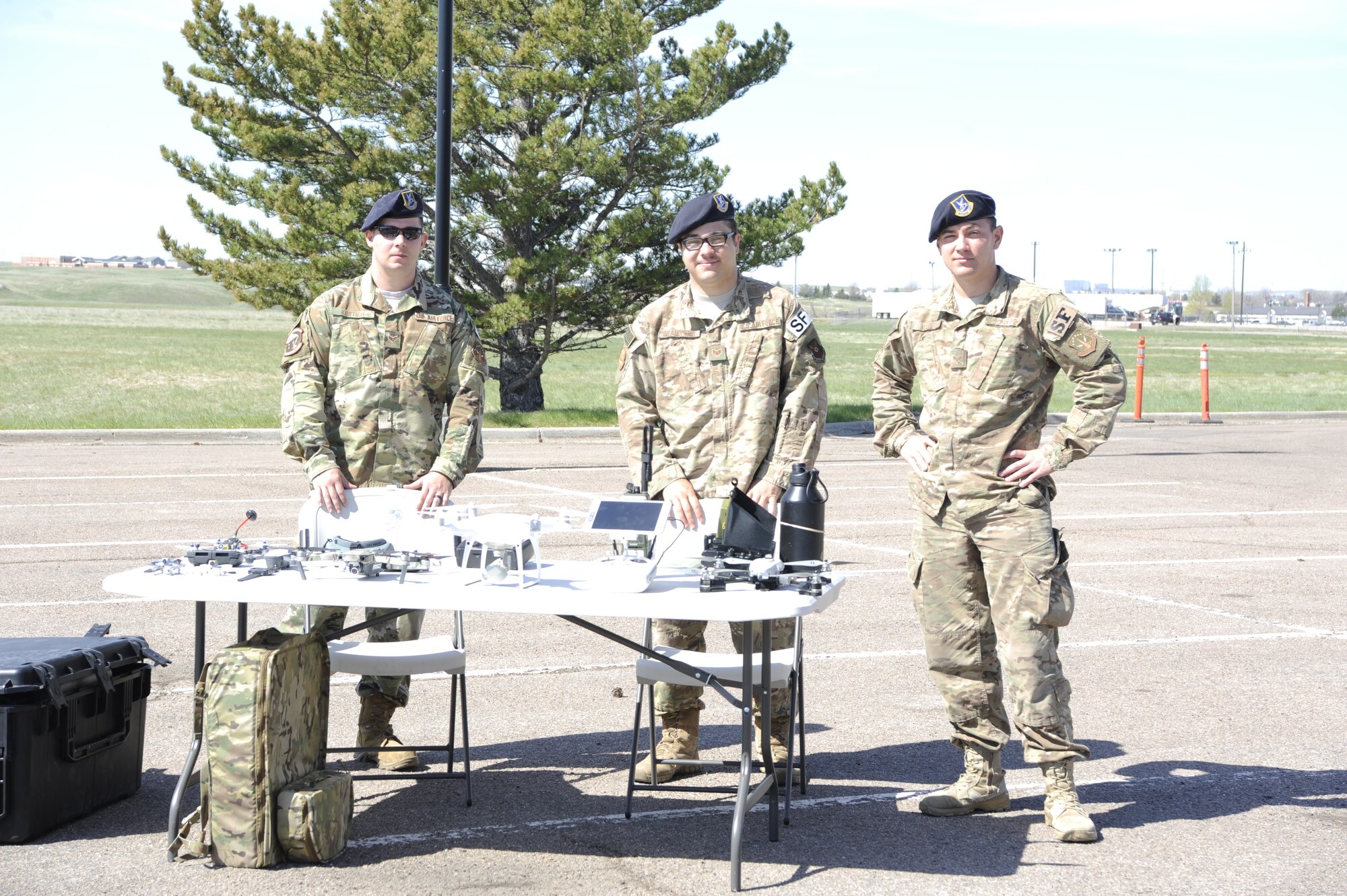Defenders with the 90th Security Support Squadron, unmanned aerial systems unit display the tools of their trade during a security forces exposition for National Police Week, May 14, 2019, on F.E. Warren Air Force Base, Wyo.  In 1962, President John F. Kennedy designated May 15, Peace Officers' Memorial Day and the week in which that day fall as, National Police Week, to pay respect to law enforcement officers who have lost their lives in the line of duty. (U.S. Air Force photo by 1st Lt. Nikita Thorpe)