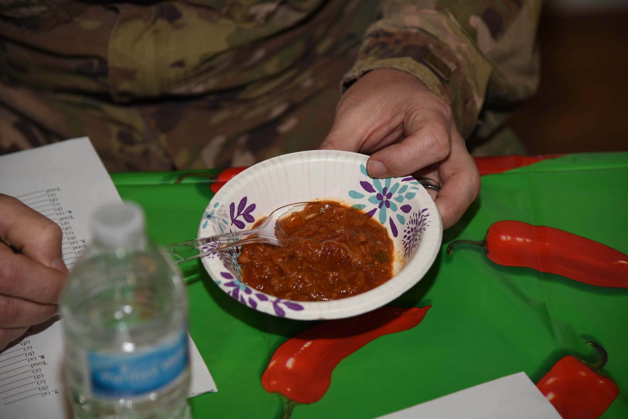 A 90th Missile Wing defender ranks a bowl of chili during a chili cook-off in support of National Police Week, May 16, 2019, on F.E. Warren Air Force Base, Wyo.  Every May 15, since 1962 has been known as Police Memorial Day. The day was established by an Act of Congress in 1962 while John F. Kennedy was president. (U.S. Air Force photo by Glenn Robertson)