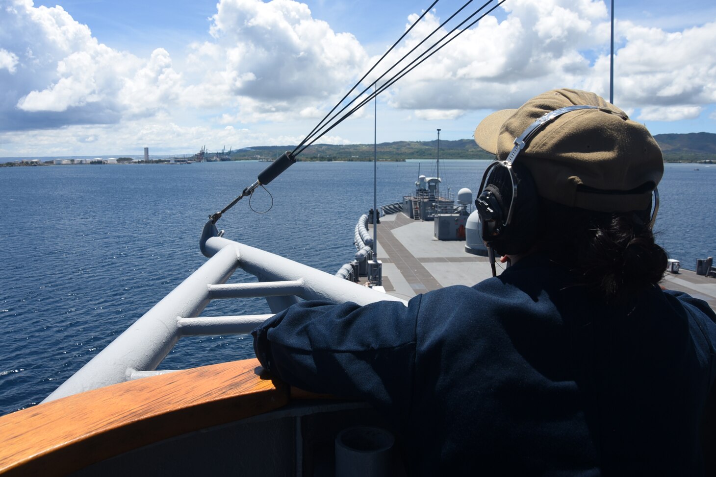 GUAM (May 20, 2019) - Quartermaster Seaman Irish Catibog, from Guam,  performs her duties as a lookout aboard U.S. 7th Fleet Flagship USS Blue Ridge (LCC 19) as the ship arrives for a port visit to Guam. Blue Ridge is the oldest operational ship in the Navy, and as 7th Fleet command ship, is responsible for fostering relationships within the Indo-Pacific Region.