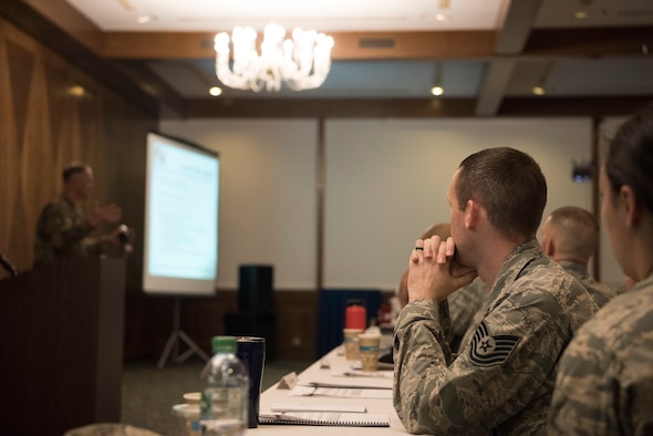 A U.S. Air Force tech. sgt. listens to Chief Master Sgt. Heath Tempel, 435th Air and Ground Operations Wing Command chief during the Flight Leadership Course on Ramstein Air Base, Germany, April 24, 2019. The event was hosted to guide current and future leaders on overcoming difficult situations, improving management skills and becoming a better leader. (U.S. Air Force photo by Senior Airman Kristof J. Rixmann)