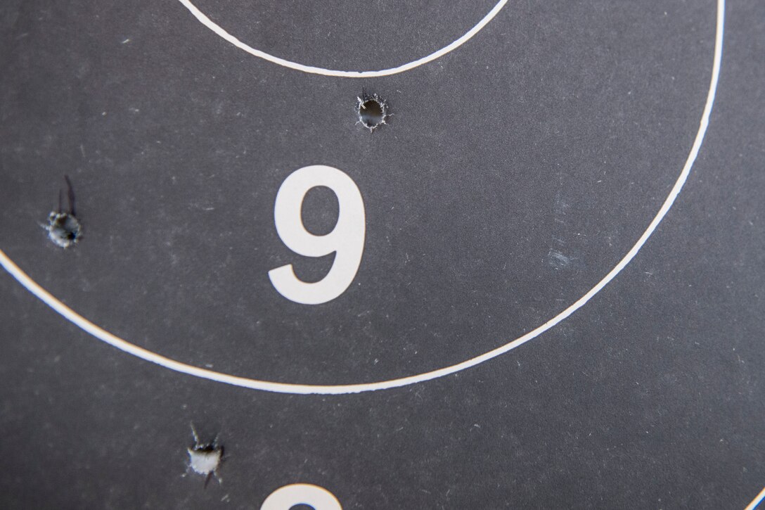 A target punctured with bullet waits to be tallied during a shooting competition on May 17, 2019, at Incirlik Air Base, Turkey. Competitors gained points based on how well they hit their targets, with the winner receiving a small prize at the end of the event. (U.S. Air Force photo by Senior Airman Joshua Magbanua)