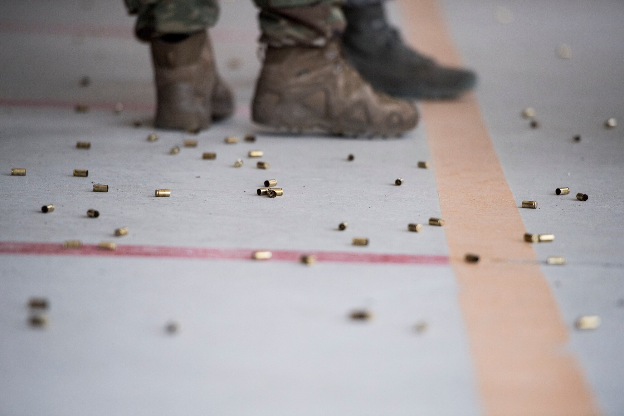 Shell casings litter the floor during a shooting competition on May 17, 2019, at Incirlik Air Base, Turkey. Each participant received 30 rounds of ammunition and shot targets at multiple positions. (U.S. Air Force photo by Senior Airman Joshua Magbanua)