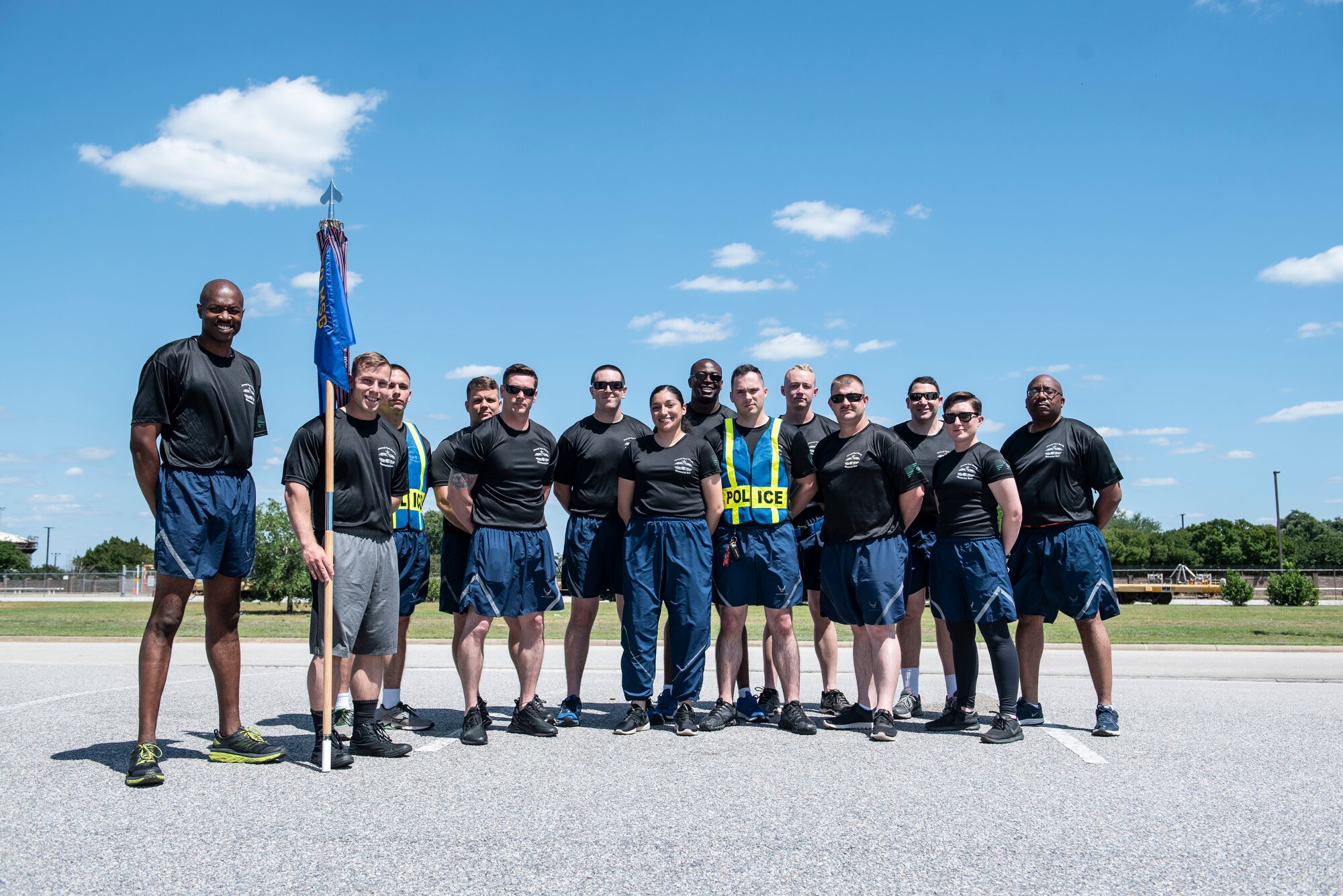 U.S. Airmen stand for a photo prior to a Port Dawg memorial run at Shaw Air Force Base, S.C., May 14, 2019.