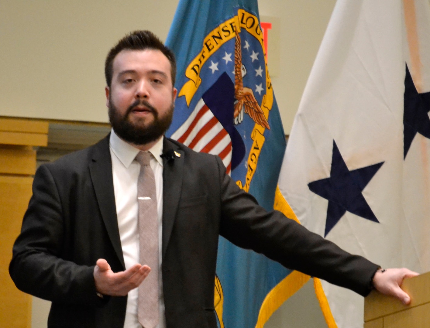 Rob Buscher, a member of the board of the Japanese American Citizens League Philadelphia Chapter and program director at Philadelphia’s Fleischer Art Memorial, speaks about Japanese Americans in World War II at an event celebrating Asian American and Pacific Islander Heritage Month at DLA Troop Support May 16, 2019 in Philadelphia.