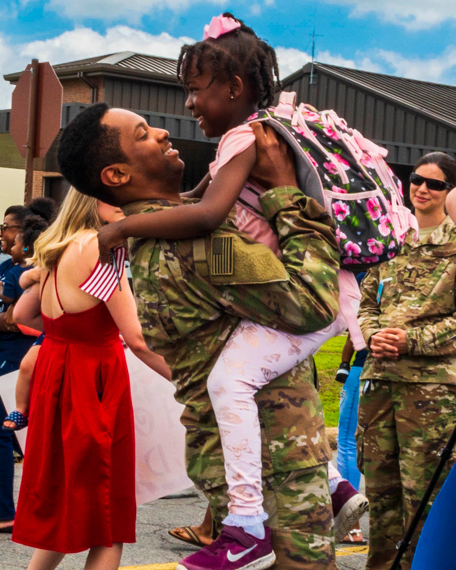 A Reserve Citizen Airman greets his family after a deployment to Southwest Asia on May 19, 2019.