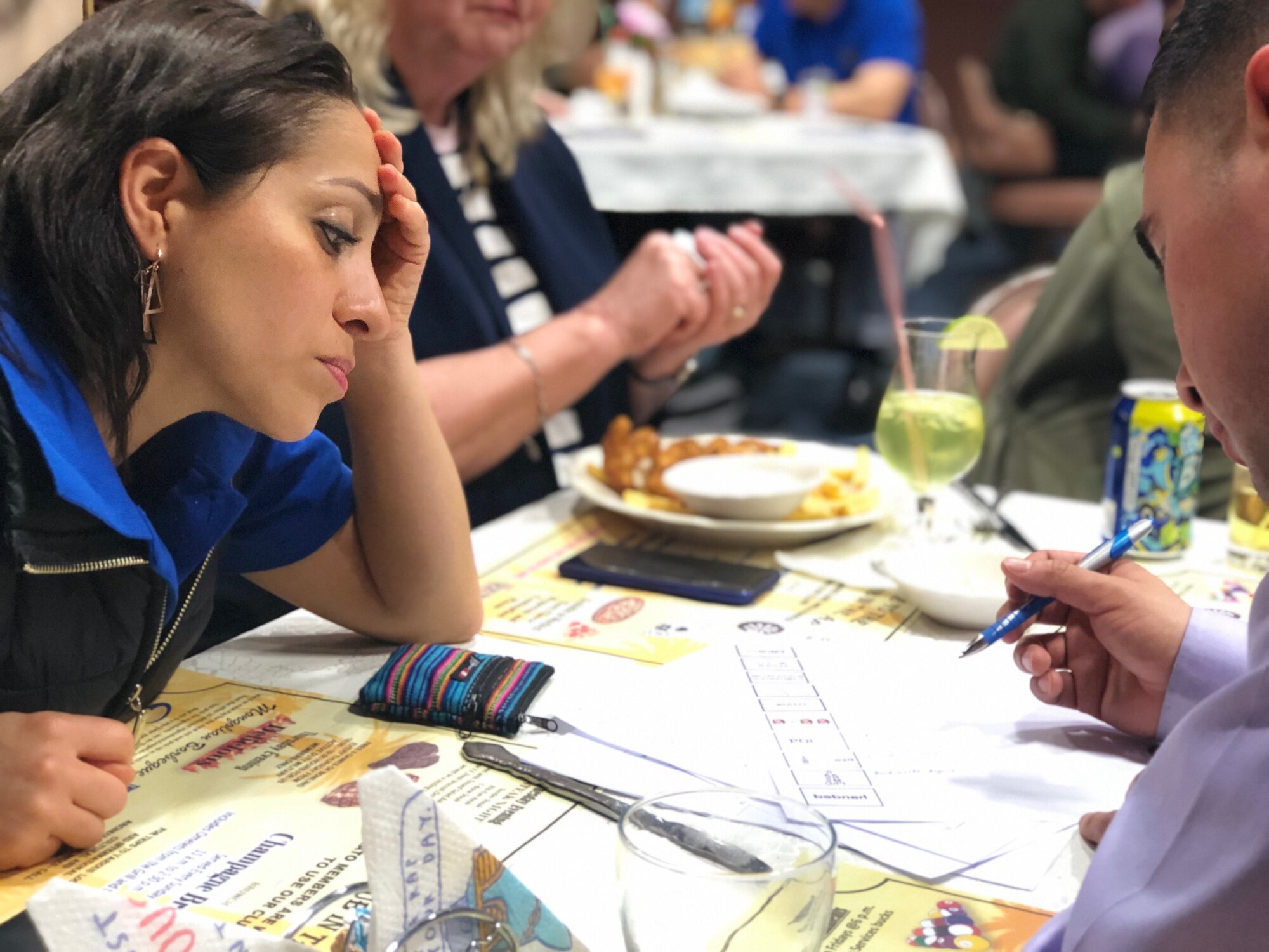 Airmen assigned to the 425th Air Base Squadron in Izmir, Turkey, compete trivia night on March 22, 2019. The Club hosts a variety of morale events where Airmen can better get to know one another. (Courtesy photo)