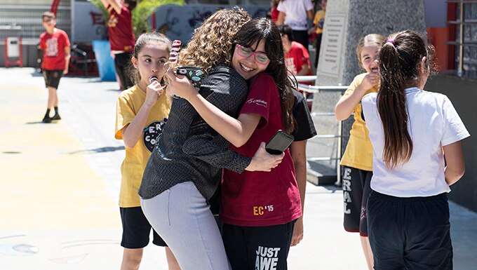 Staff Sgt. Kimberly Marquez, 39th Operations Support Squadron air traffic control watch supervisor, bids the students farewell during a local school visit on May 9, 2019, in Adana, Turkey. The visit allowed the students to practice and showcase their English skills while also understanding the role of the U.S. Airmen play in protecting the southern region. (U.S. Air Force photo by Staff Sgt. Ceaira Tinsley)