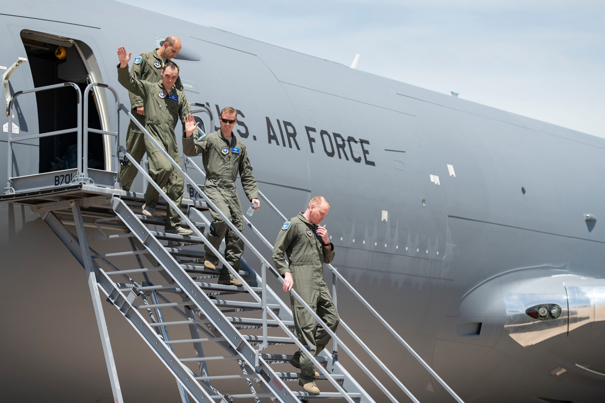 Crew members of the newly-arrived KC-46 Pegasus exit the aircraft, May 18, 2019, at Altus Air Force Base, Okla. The KC-46 is a new military refueling aircraft capable of carrying 212,299 pounds of fuel and 61,000 pounds of cargo, 10 percent more than the KC-135 Stratotanker can hold. (U.S. Air Force photo by Airman 1st Class Breanna Klemm)