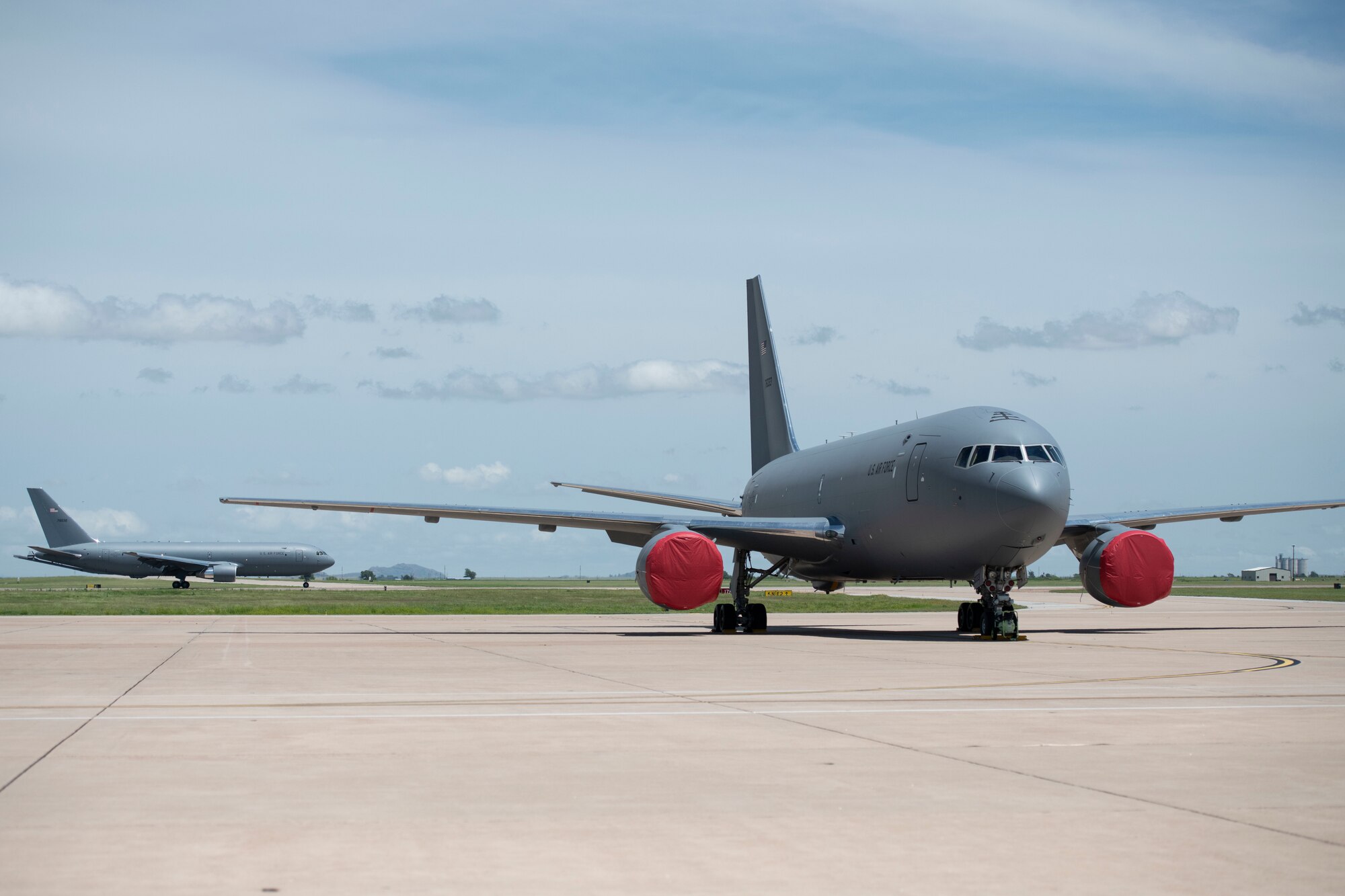 A fourth KC-46 Pegasus lands on the flight line, May 18, 2019, at Altus Air Force Base, Okla. The KC-46 is a military aerial refueling and transport aircraft designed to replace the current KC-135 Stratotanker. (U.S. Air Force photo by Airman 1st Class Breanna Klemm)