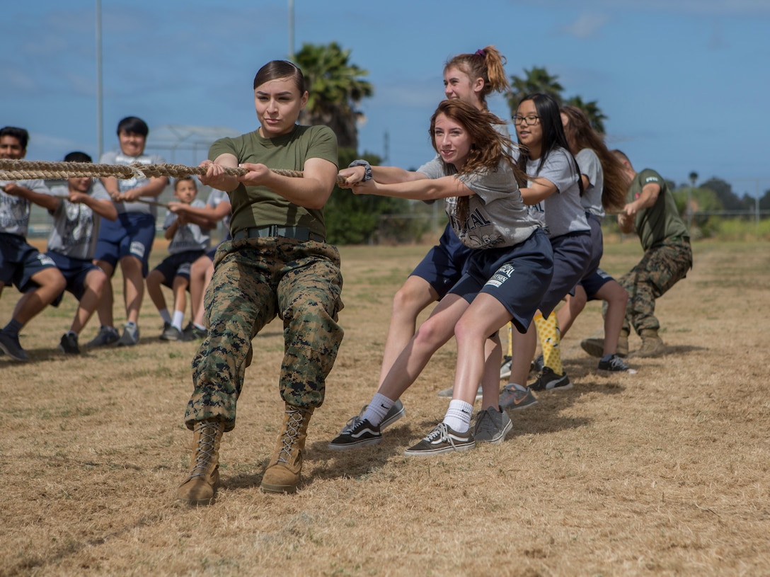 Marines with Marine Corps Air Station Miramar visited Challenger Middle School for a physical fitness challenge in San Diego, May 17, 2019. The Single Marine Program organized this event as a fun way to get kids on their feet and away from screens by testing their strength and endurance. (U.S. Marine Corps Photo By Cpl. Jesus Flores)