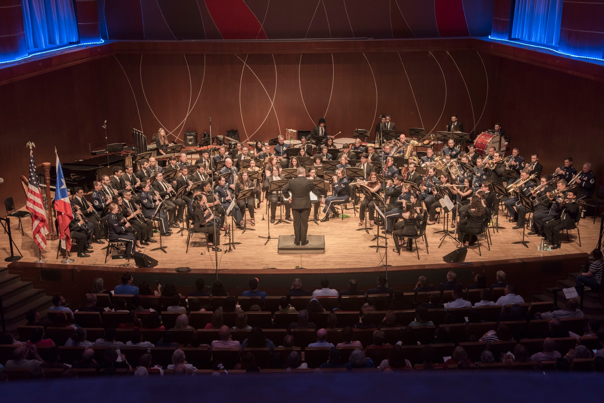 The United States Air Force Band of the West, from Joint Base San Antonio-Lackland, finish their week-long tour at the Conservatorio de Música de Puerto Rico, Sala Sanromá, in conjunction with the CMPR concert band, April 7, 2019, in San Juan, Puerto Rico. The USAF Band of the West are touring the island of Puerto Rico to tell the Air Force's story through live music and to continue building relationships with Puerto Rican communities during concerts. (Air Force photo by: Airman 1st Class Shelby Pruitt)