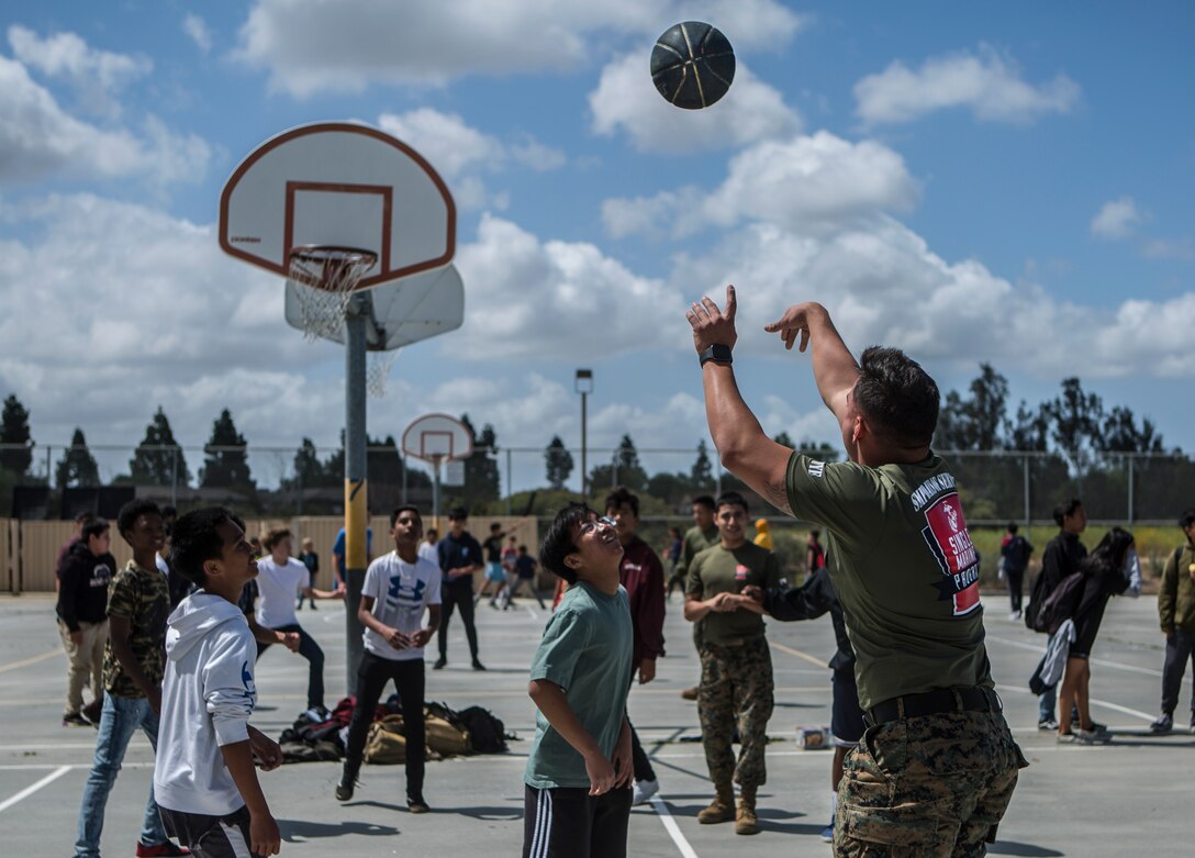 Marines with Marine Corps Air Station Miramar visited Challenger Middle School for a physical fitness challenge in San Diego, May 17, 2019. The Single Marine Program organized this event as a fun way to get kids on their feet and away from screens by testing their strength and endurance. (U.S. Marine Corps Photo By Cpl. Jesus Flores)