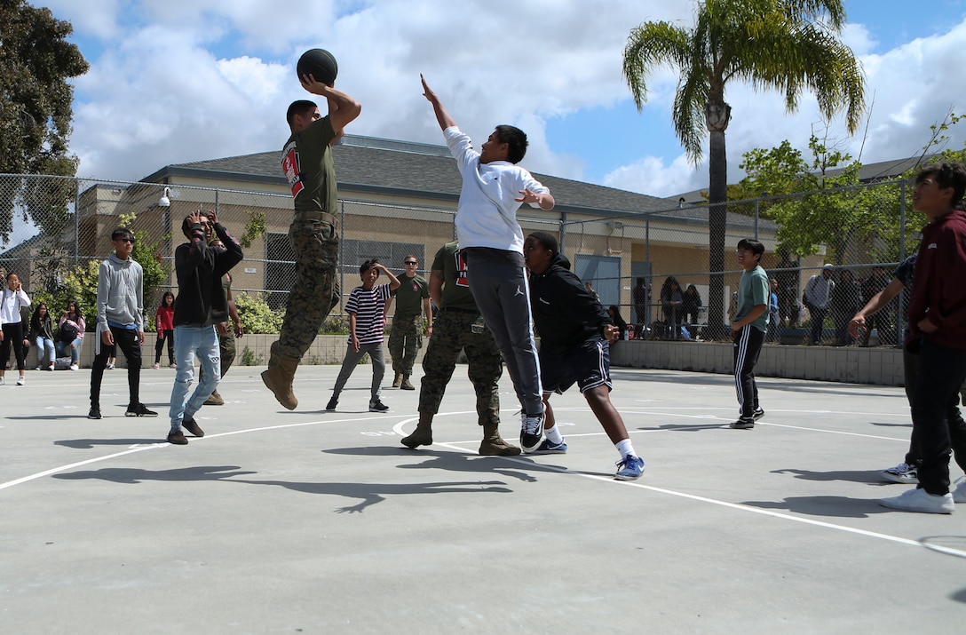 Marines with Marine Corps Air Station Miramar visited Challenger Middle School for a physical fitness challenge in San Diego, May 17, 2019. The Single Marine Program organized this event as a fun way to get kids on their feet and away from screens by testing their strength and endurance. (U.S. Marine Corps Photo By Cpl. Jesus Flores)