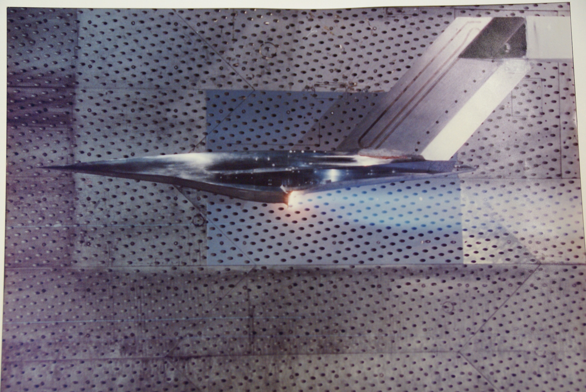A model of the X-43 testing in one of the AEDC wind tunnels. The X-43, part of the NASA Hyper-X program, was an experimental unmanned hypersonic aircraft. It has since been replaced by the Boeing X-51 WaveRider. (U.S. Air Force photo)