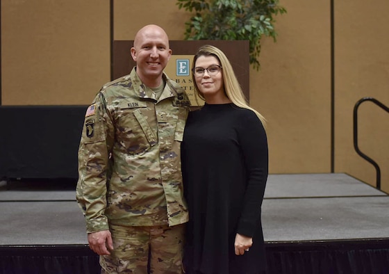 Sarah Klein, a security specialist with the Space and Missiles Combined Test Force at Arnold Air Force Base, and her husband, Brad, Chief Warrant Officer 2 with the 278th Armored Cavalry Regiment Support Squadron of the Tennessee Army National Guard, pose for a photo following Brad’s promotion ceremony March 30 in Murfreesboro. The couple attended the ceremony after helping seven children involved in a crash that morning on Interstate 24. (Courtesy photo)