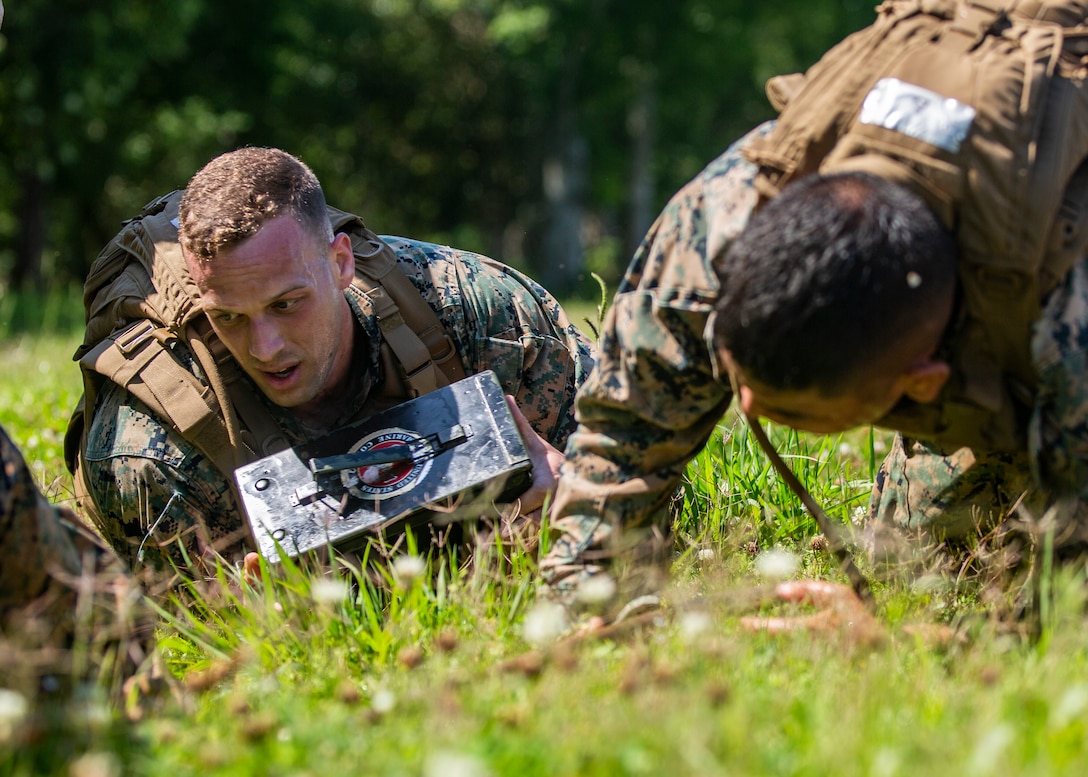 Marines with Martial Arts Instructor Course 1-19 conduct a 3-mile run