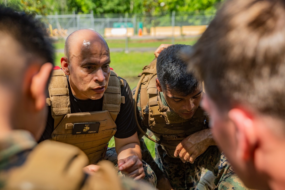 Marines with Martial Arts Instructor Course 1-19 conduct a 3-mile run