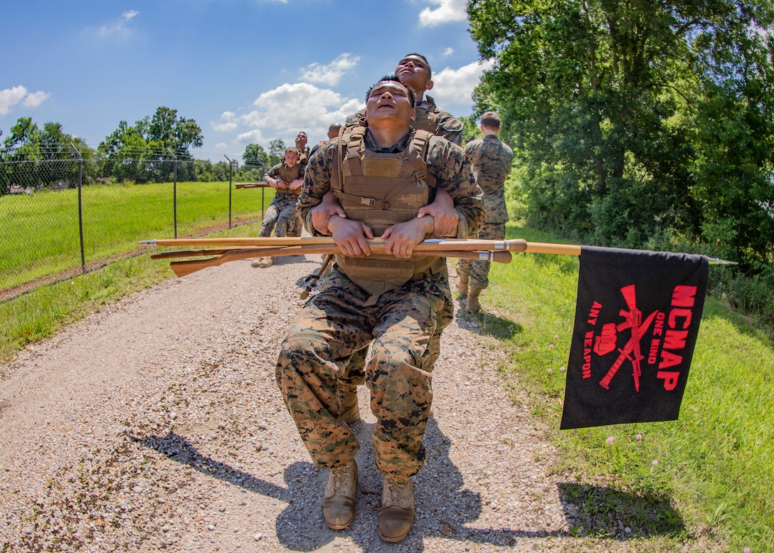 Marines with Martial Arts Instructor Course 1-19 conduct a 3-mile run