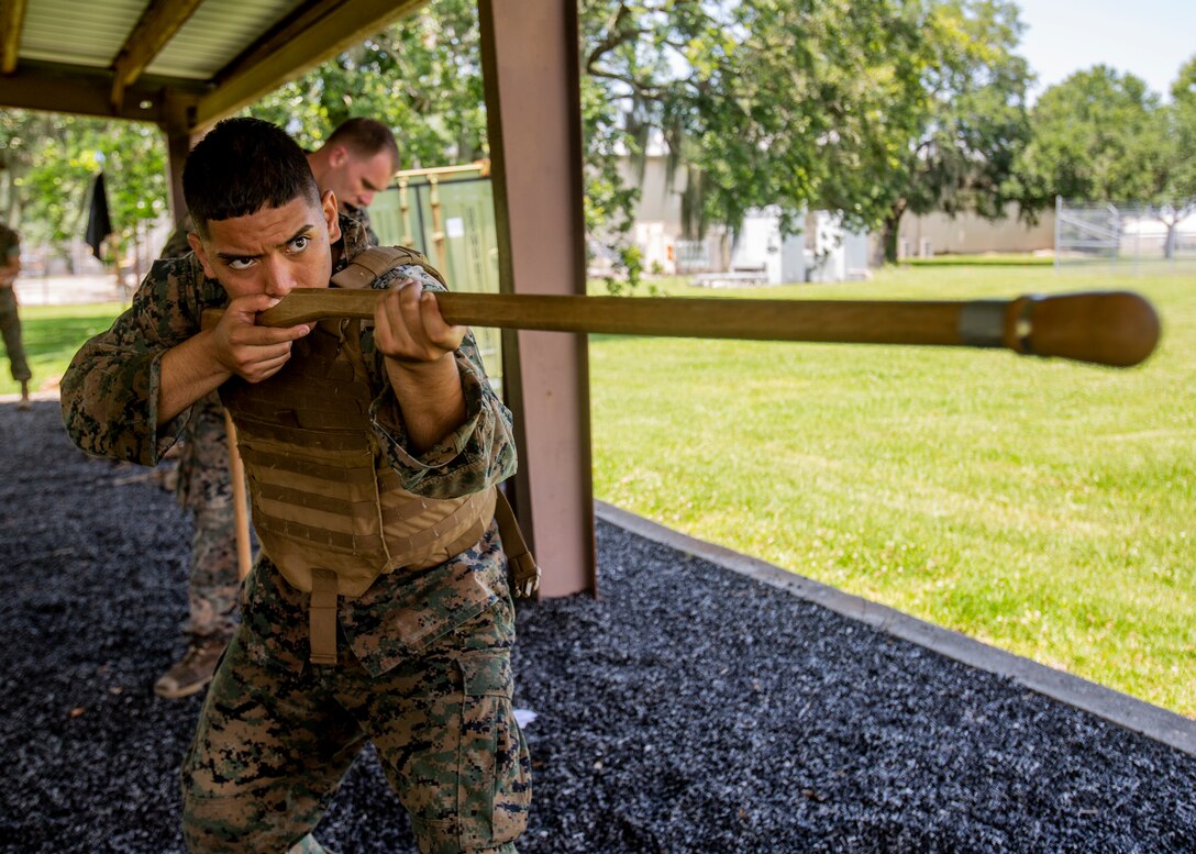 Marines with Martial Arts Instructor Course 1-19 conduct a 3-mile run