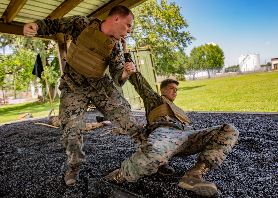 Marines with Martial Arts Instructor Course 1-19 conduct a 3-mile run
