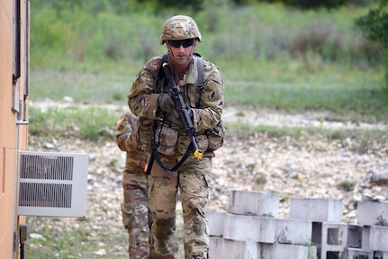 A Soldier assigned to the Medical Professional Training Brigade practices Warrior Task and Battle Drills at Joint Base San Antonio-Camp Bullis.