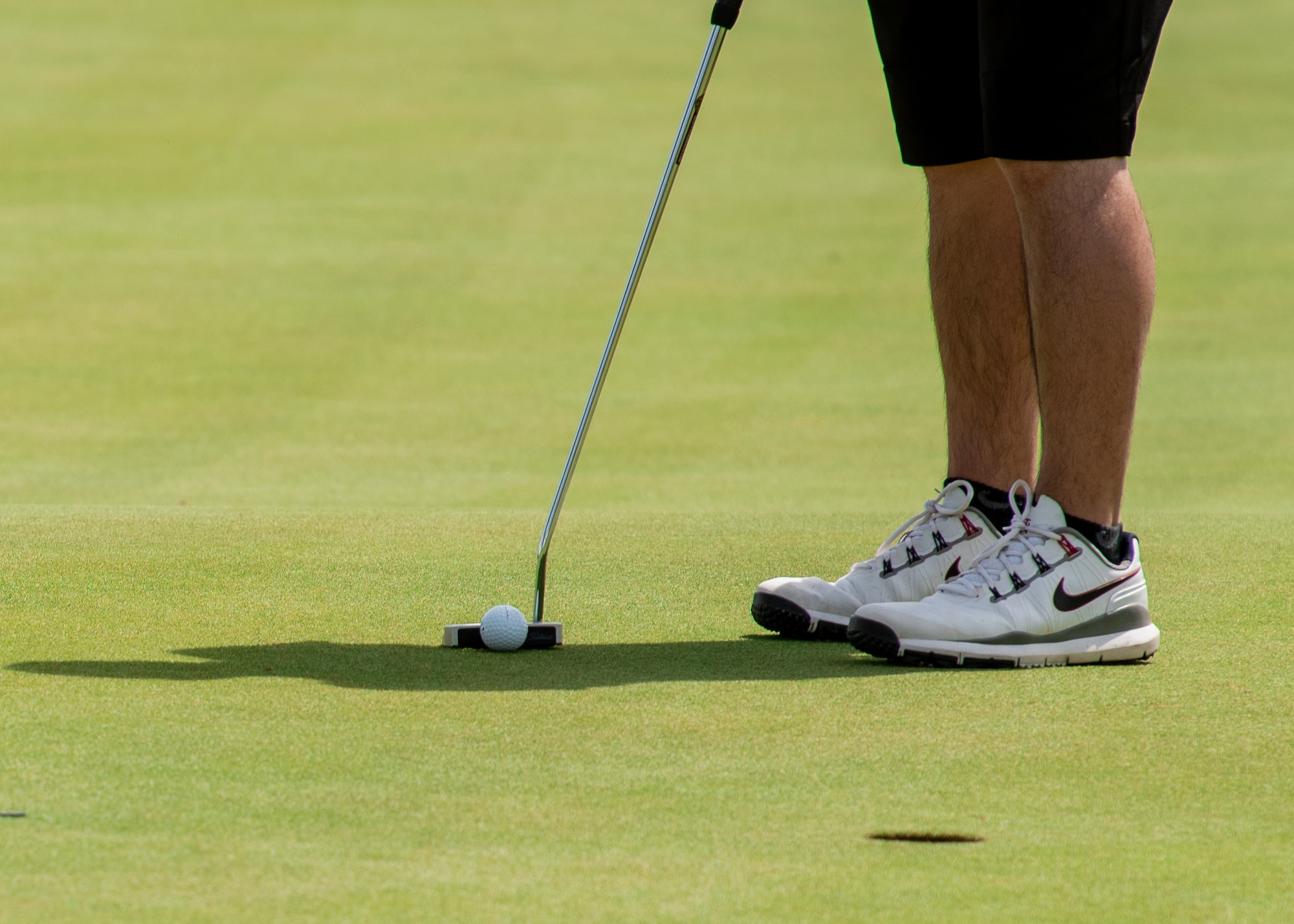 An Armed Forces Golf Championship participant prepares to putt, May 16, 2019, at Falcon Dunes Golf Course near Luke Air Force Base, Ariz.