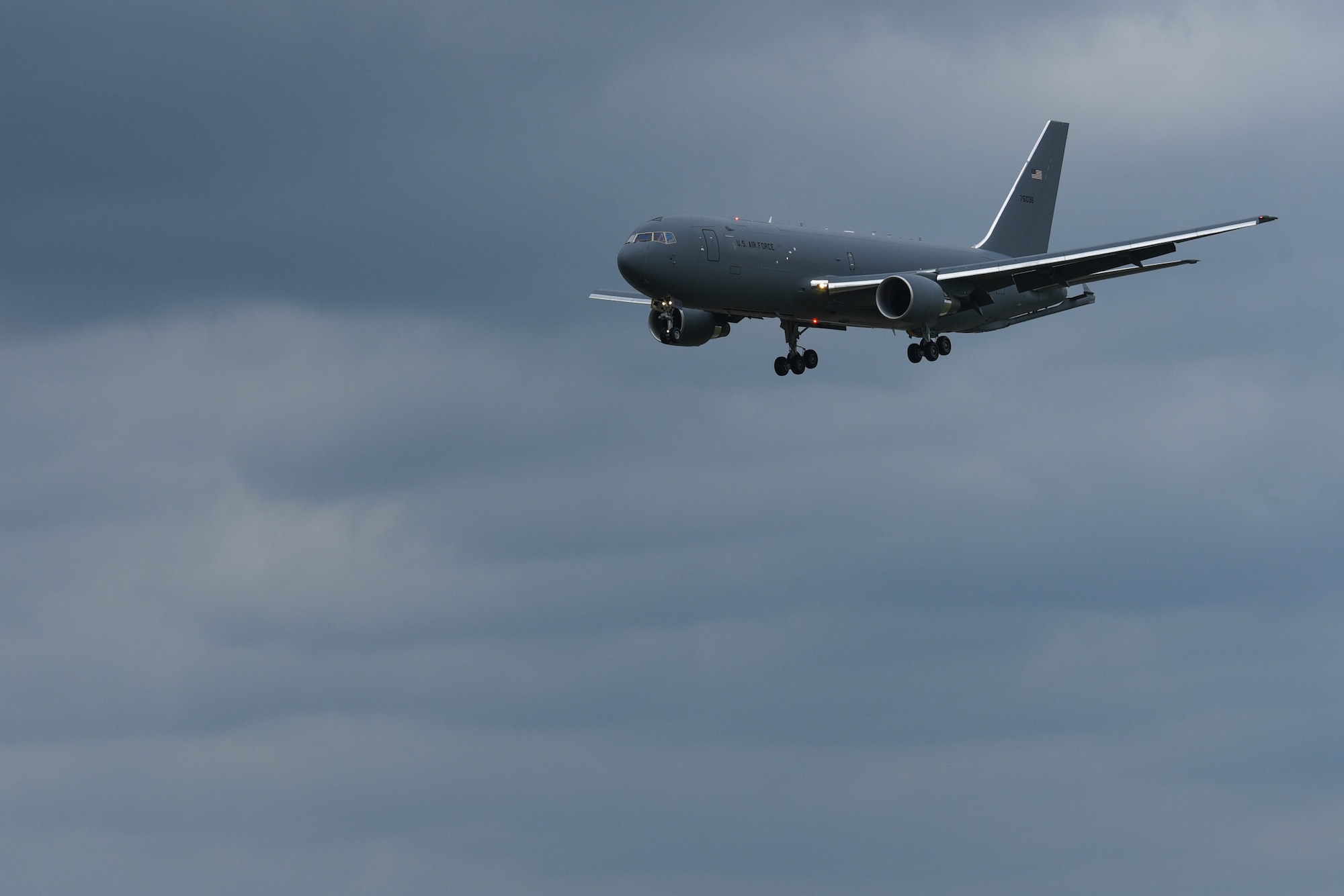 A KC-46A Pegasus lands May 17, 2019, at McConnell Air Force Base, Kan.  This KC-46 is Team McConnell’s sixth delivery, and it will join a fleet that will advance air refueling capabilities around the world. (U.S. Air Force photo by Airman 1st Class Alexi Myrick)