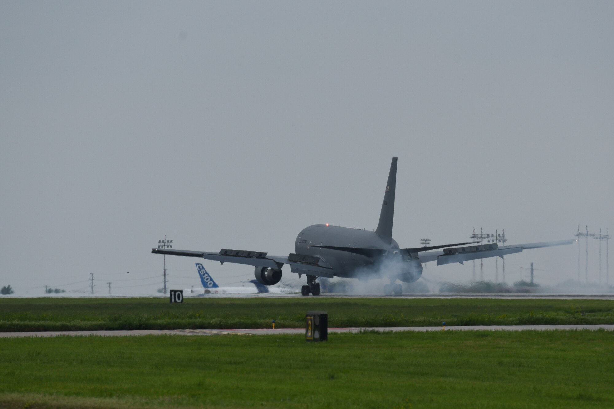 A KC-46A Pegasus lands May 17, 2019, at McConnell Air Force Base, Kan.  This KC-46 is Team McConnell’s sixth delivery, and it will join a fleet that will advance air refueling capabilities around the world.(U.S. Air Force photo by Airman 1st Class Alexi Myrick)