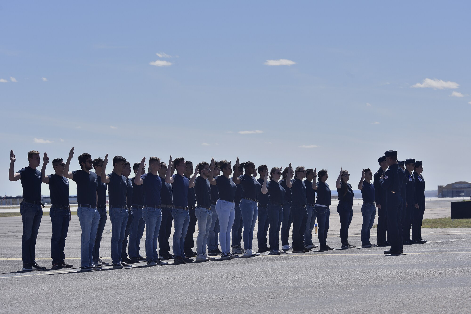 Future Airmen take the oath of enlistment at the Kirtland Air and Space Fiesta May 18, 2019, here. The Air Show featured a series of aeronautical and ground-based performances, and a STEM and space exhibition. The Fiesta was capped off by the U.S. Air Force Thunderbirds. Early estimates put the crowd at more than 35,000. (U.S. Air Force photo by Airman 1st Class Austin J. Prisbrey)