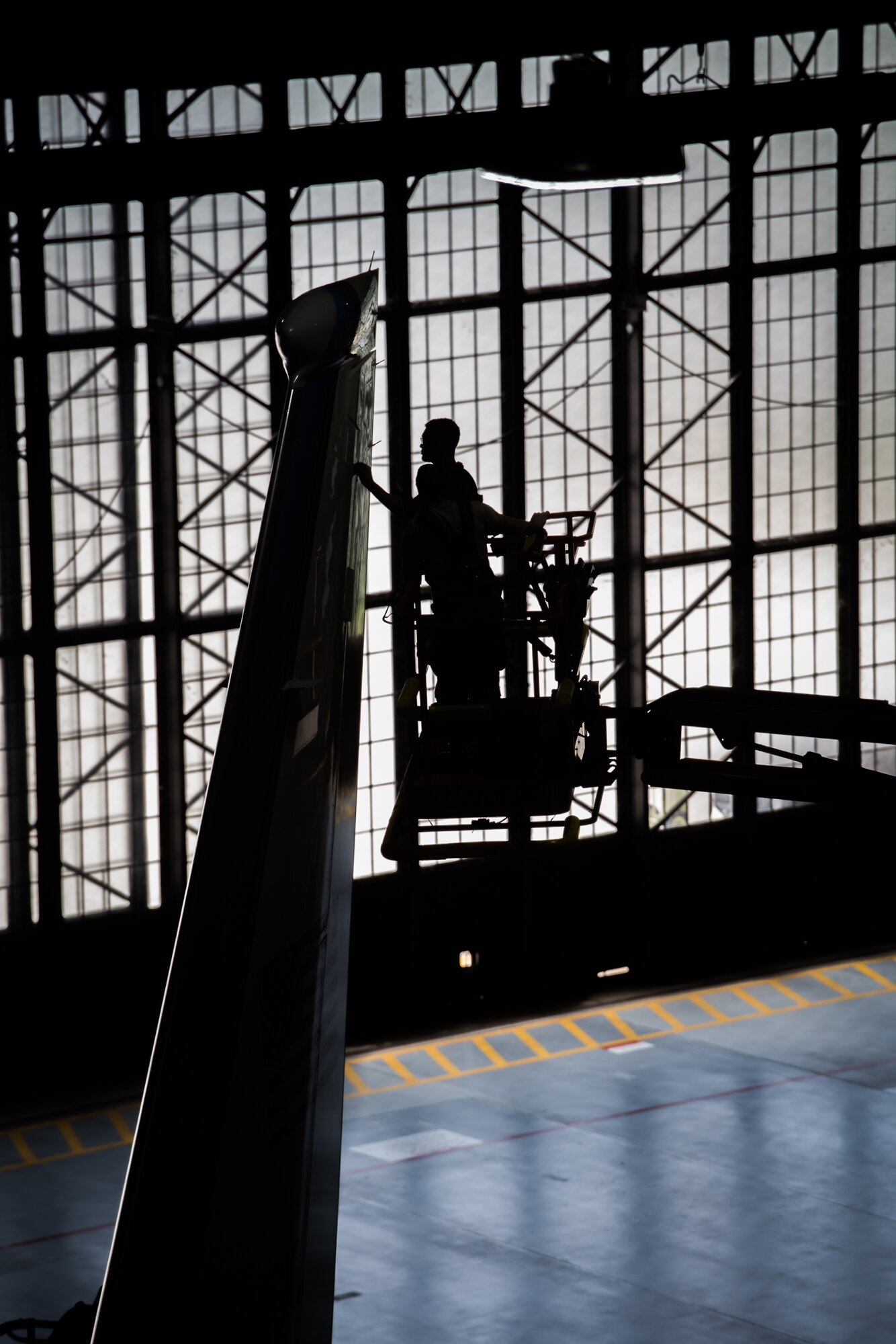 Staff Sgt. Cedric Williams and Staff Sgt. Blake Harrison, crew chiefs with the 932nd Airlift Wing Maintenance Squadron, remove rudder panels in preparation for lubrication during routine maintenance, May 15, 2019, Scott Air Force Base, Illinois (U.S. Air Force photo by Christopher Parr)