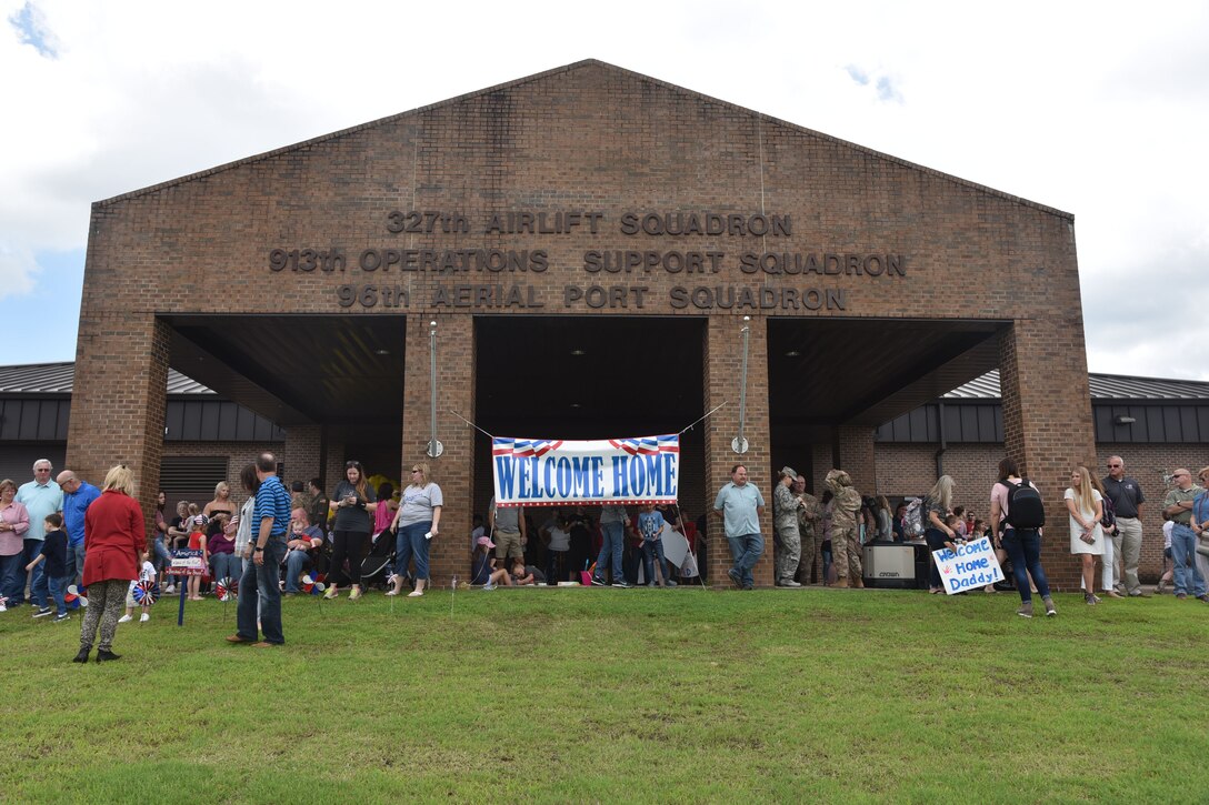 Family members of Team Little Rock gather at the 327th Airlift Squadron to greet returning Reserve Citizen Airmen at Little Rock Air Force Base, Arkansas, May 19, 2019
