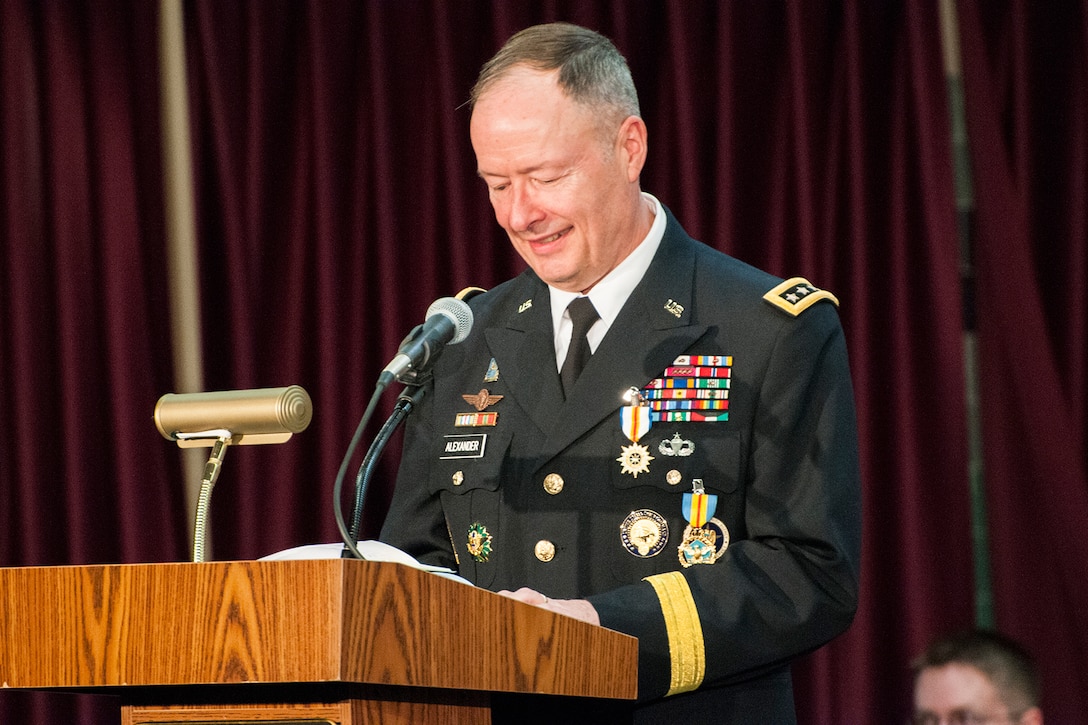 GEN Keith Alexander, USA, addresses the audience at his retirement ceremony, 28 March 2014