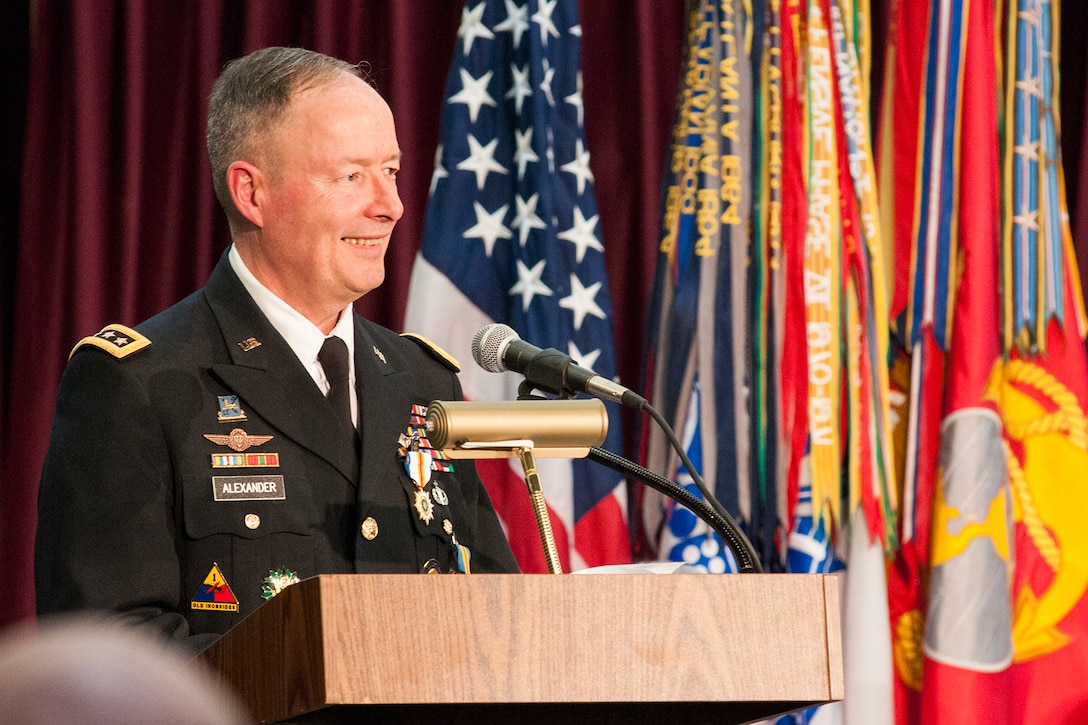 GEN Keith Alexander, USA, addresses the audience at his retirement ceremony, 28 March 2014