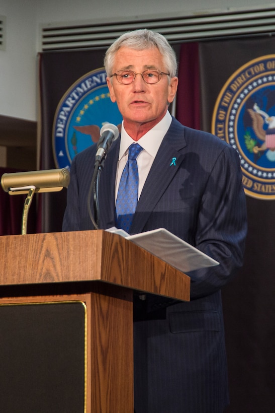 Secretary of Defense Chuck Hagel addresses attendees at the retirement ceremony for GEN Keith Alexander, USA, on March 28, 2014