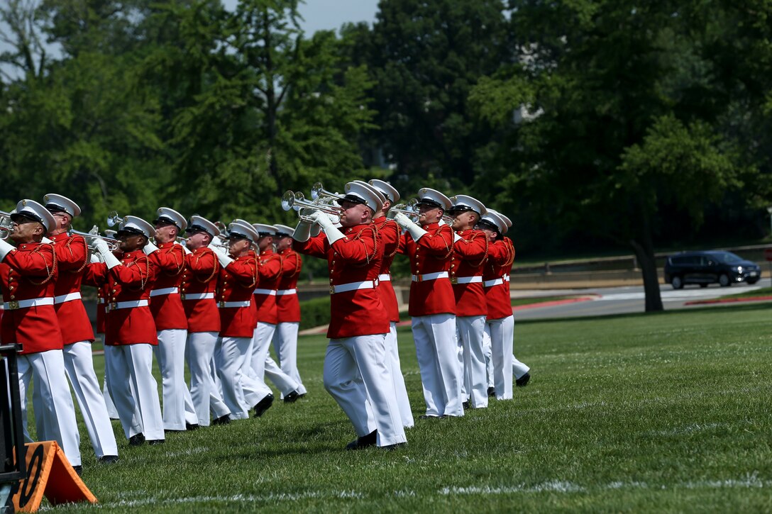 Marines with “The Commandant's Own,” U.S. Marine Drum and Bugle Corps, perform during a Battle Color Ceremony at the United States Naval Academy in Annapolis, Maryland, May 20, 2019. Parents, family members and guests of the First Class Midshipmen were invited to attend a series of events, in honor of the graduates. (U.S. Marine Corps photo by Pfc. Allen Sanders)
