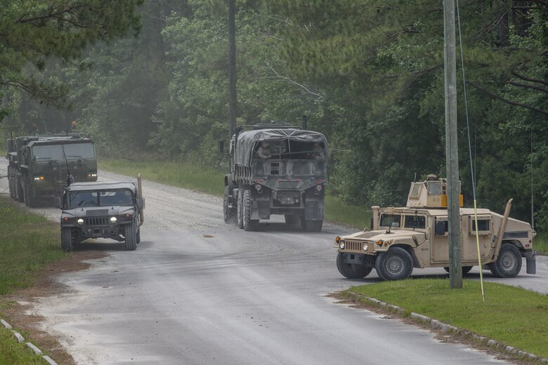 U.S. Marines with Combat Logistics Battalion 8, Combat Logistics Regiment 2, 2nd Marine Logistics Group, resupply Marines during a training exercise at Camp Lejeune, N.C., May 16, 2019. CLB 8 held the exercise to train Marines in core mission tasks and provide company-level convoy operations training. (U.S. Marine Corps photo by Cpl. Damion Hatch)