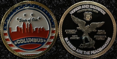 front and back of police coin
